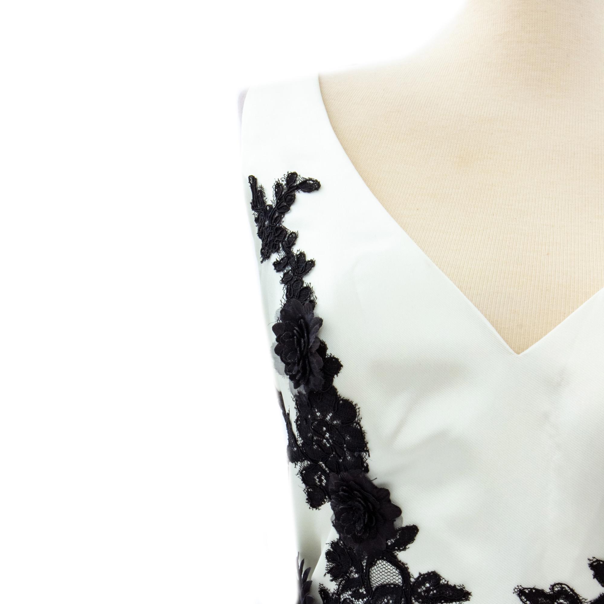 Large editorial shot of embroidered gown detail