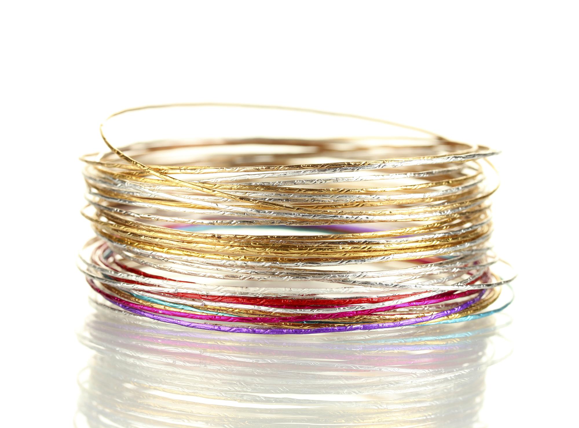 Close up of metallic thread embroidery on silk